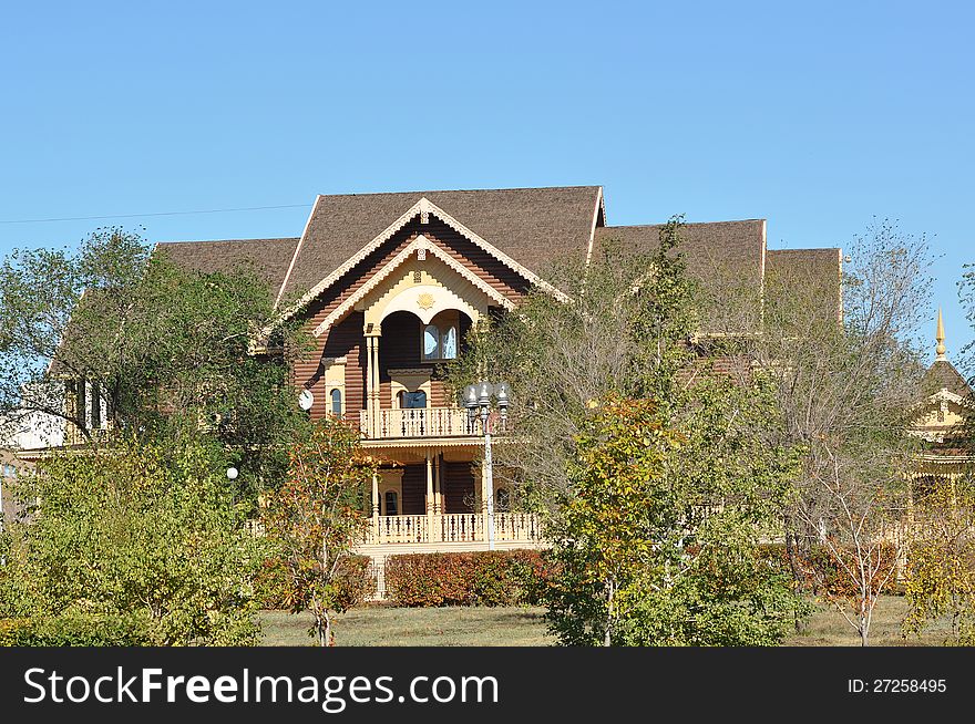 The wooden facade of the building The national village, the city of Orenburg, Southern Ural, Russia