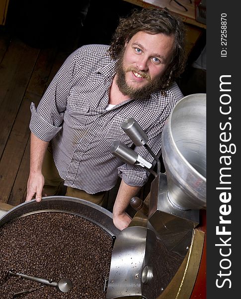 A coffee roaster keeps the beans coming. A coffee roaster keeps the beans coming