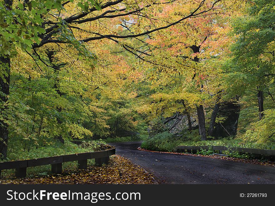 Raod leads to nowhere in Autumn Foliage, near Smugglers Notch, Stowe, Vermont. Raod leads to nowhere in Autumn Foliage, near Smugglers Notch, Stowe, Vermont