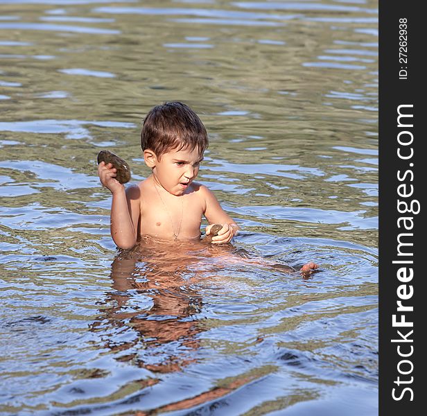 Boy playing in water