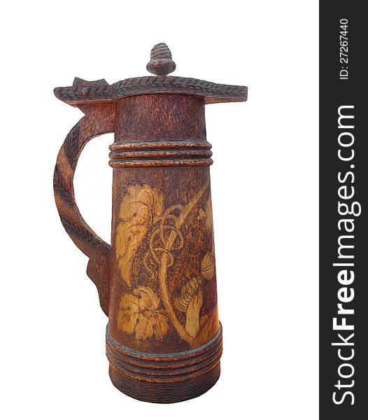 Old carved wooden beer stein isolated.