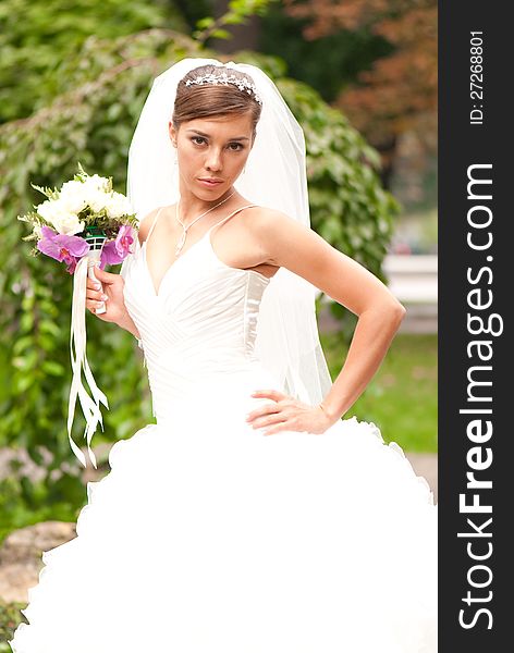 Beautiful bride with flower outdoor