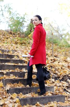 Girl In The Red Coat Is The Ladder Fall Royalty Free Stock Image Girl In The Red Coat Is The Ladder Fall Royalty Free Stock Image