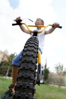 Boy On A Bicycle In The Park Stock Images Boy On A Bicycle In The Park Stock Images