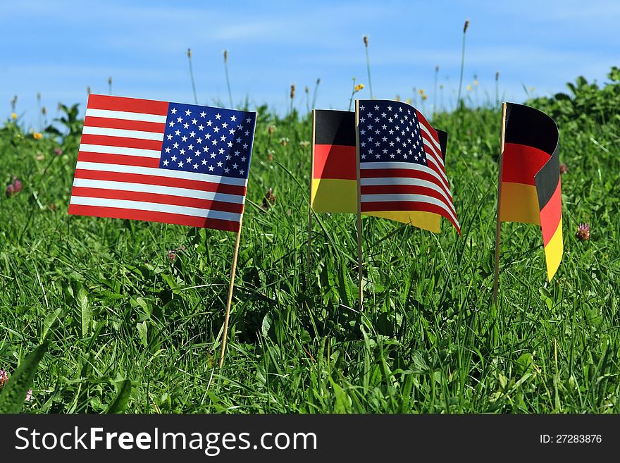 Germany and America, together, with each other - shown with flags. Germany and America, together, with each other - shown with flags
