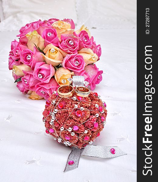 Bride bouquet with wedding rings. Bride bouquet with wedding rings.