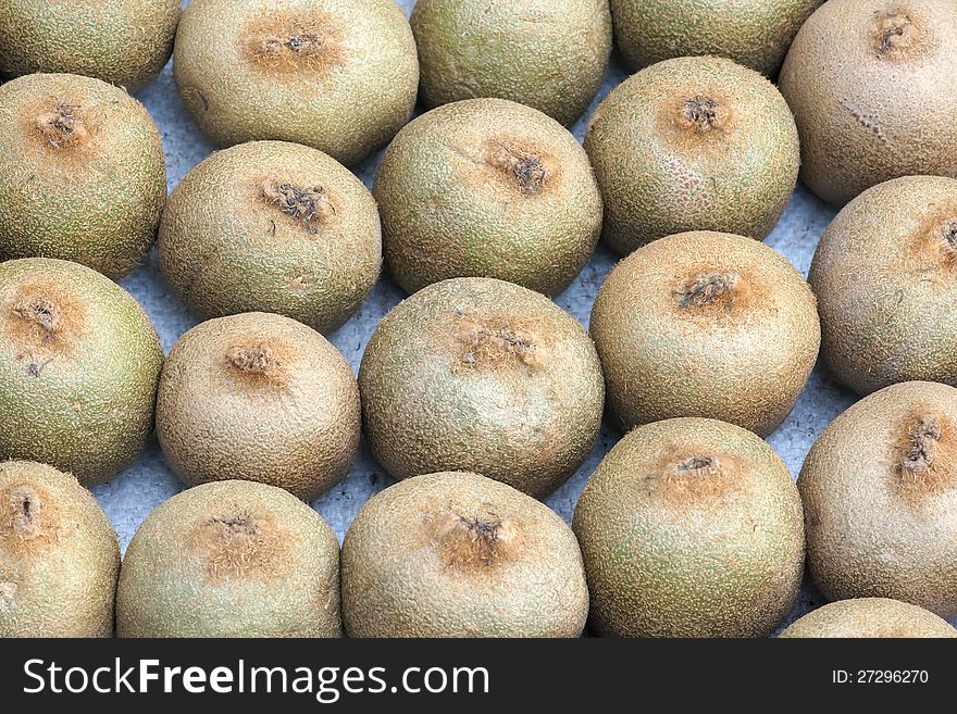 The background of ripe kiwi fruits