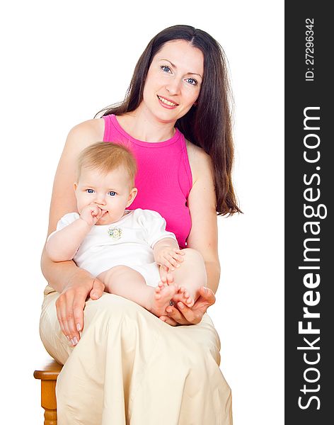 Happy baby sitting on her mother's lap. Happy baby sitting on her mother's lap