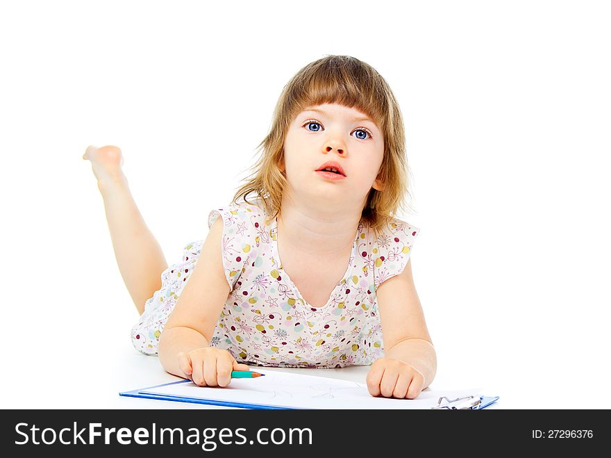 Little Girl Drawing With A Pencil