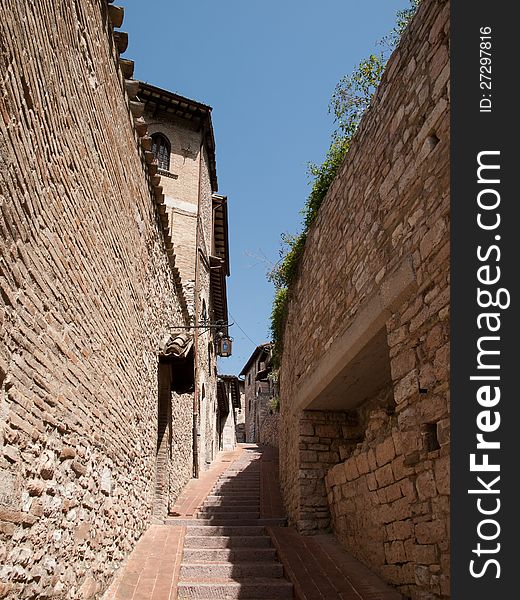 The narrow street of Assisi in Italy. The narrow street of Assisi in Italy