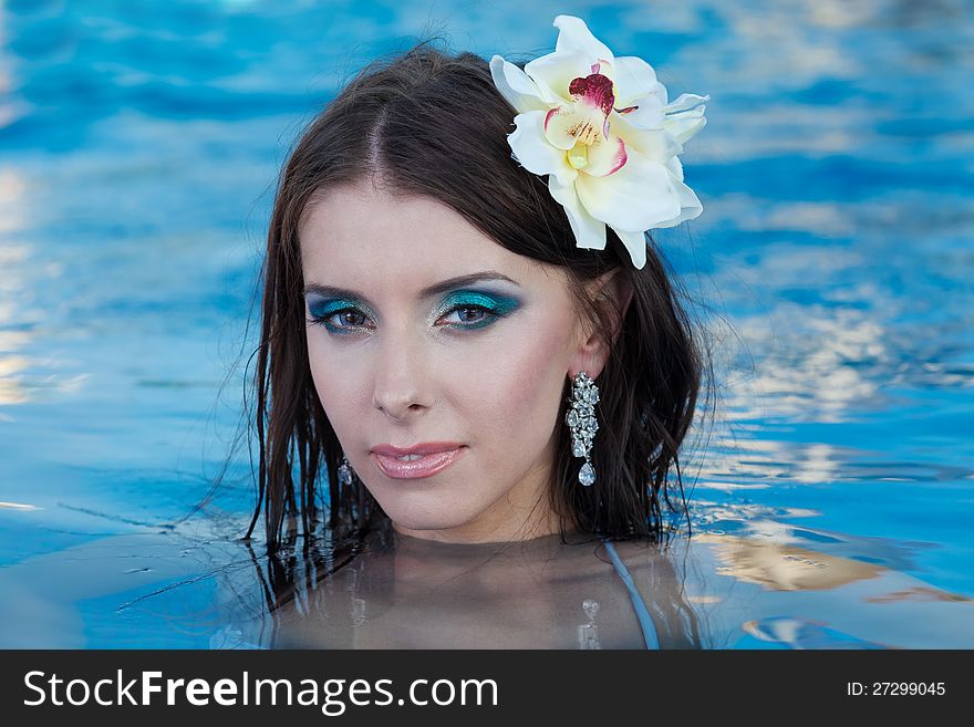 The beautiful girl in pool