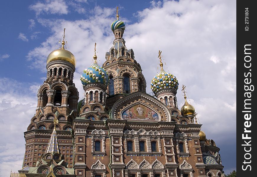 Golden tower top of a russian cathedral in St.Petersburg