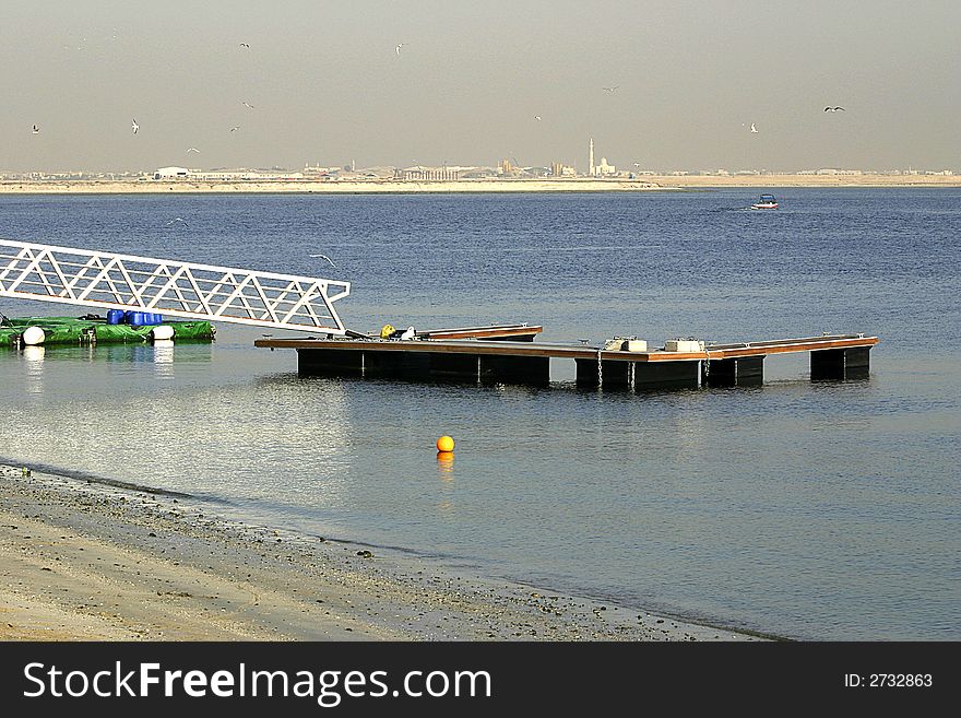 Small dock for private yacht at the creek in Dubai United Arab Emirates. Small dock for private yacht at the creek in Dubai United Arab Emirates