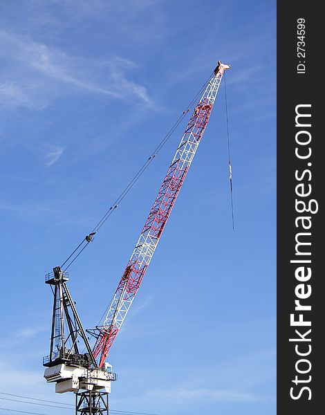 Large tall crane blue sky background