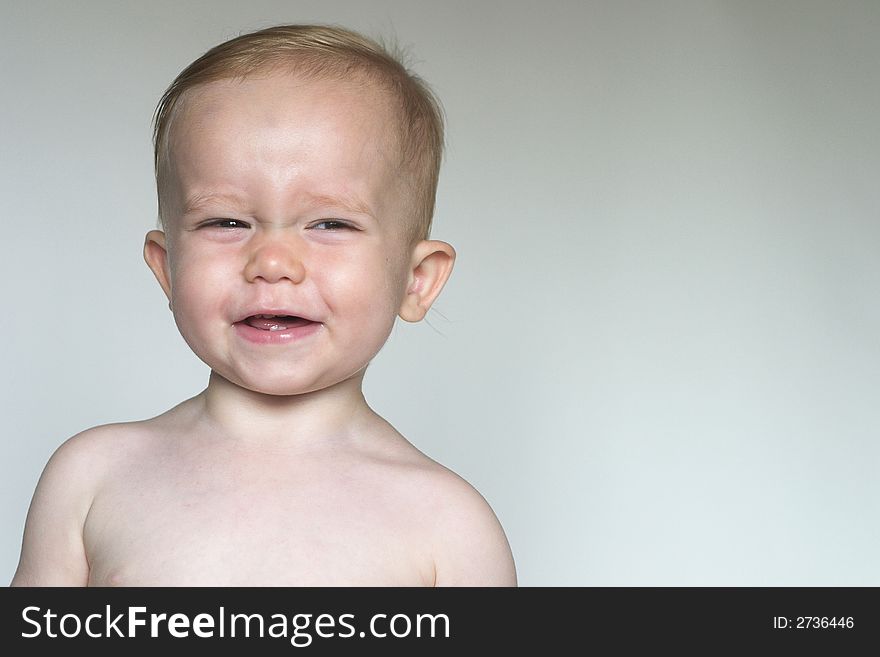 Image of a cute laughing toddler