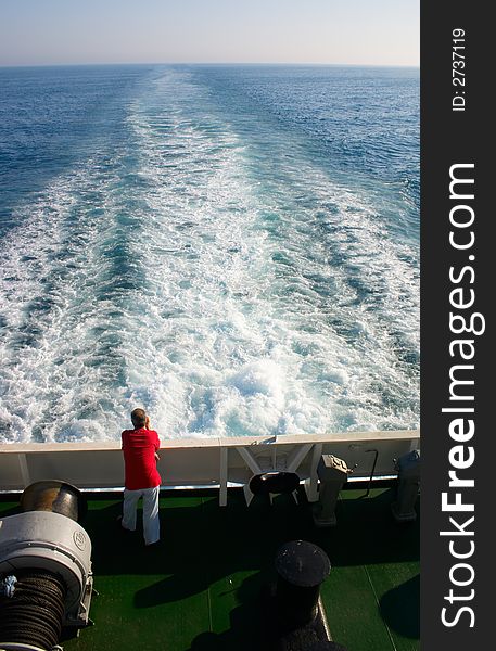 Man on cruise liner in the sea