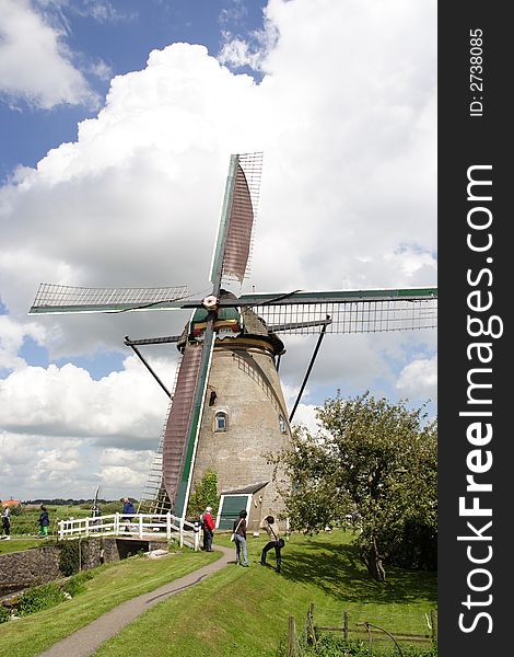 Antique Dutch windmill that is still being used as a pumping station to keep the polder dry.