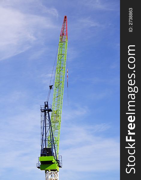 Large tall crane blue sky background