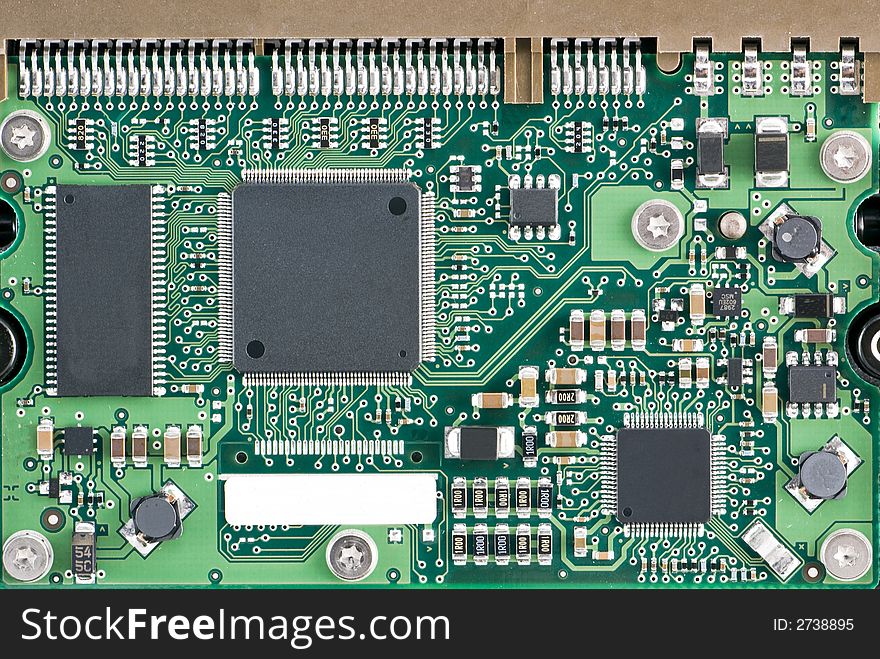 The incricate circuitry of the mother board of a computer. The incricate circuitry of the mother board of a computer.