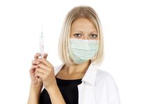 Doctor With A Syringe And A Mask Stock Image Doctor With A Syringe And A Mask Stock Image