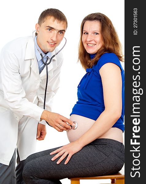 Doctor examines pregnant women isolated on white background. Doctor examines pregnant women isolated on white background