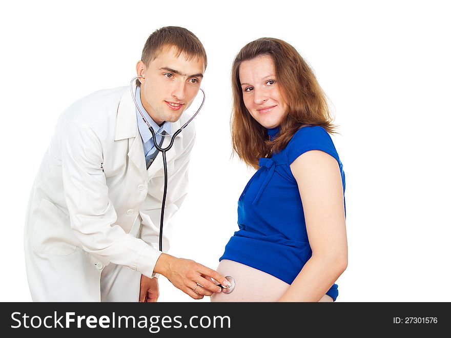 Doctor Listening To The Fetus Inside The Woman S