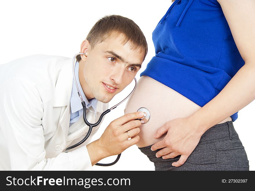 Doctor listening to fetal heart. Doctor listening to fetal heart