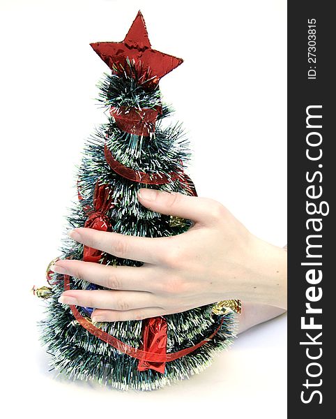 Festively decorated Christmas tree gift in hand. Festively decorated Christmas tree gift in hand