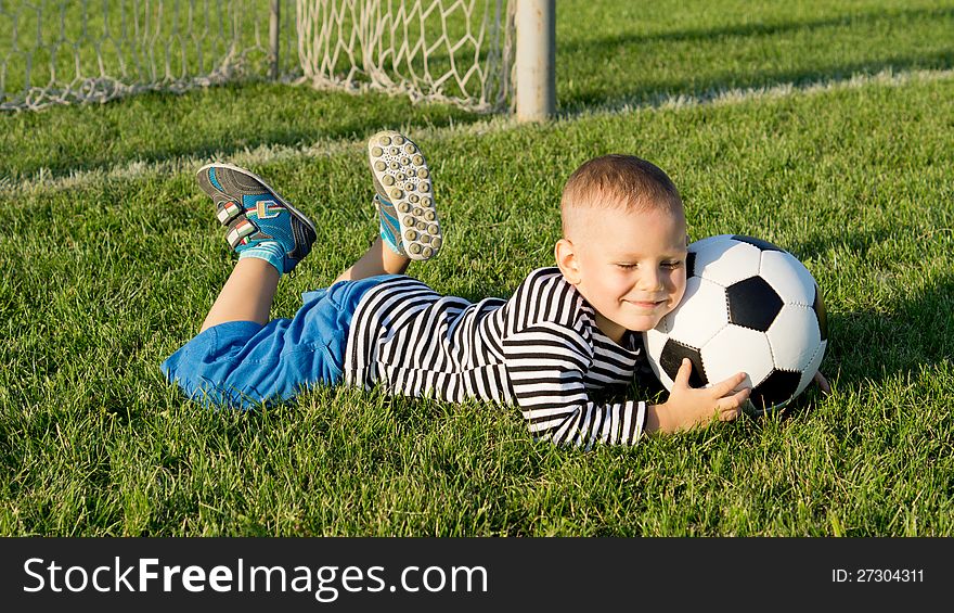 Young boy with a soccer ball