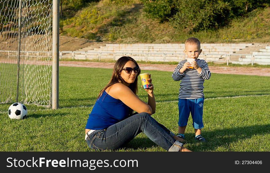 Mum And Son Playing Soccer