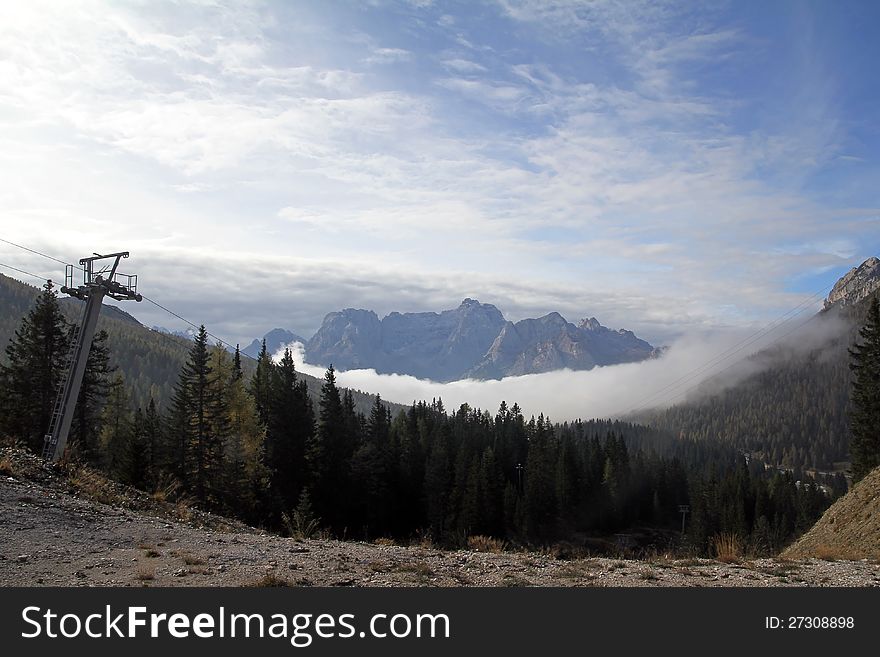 Morning fog in the mountains of the Dolomites