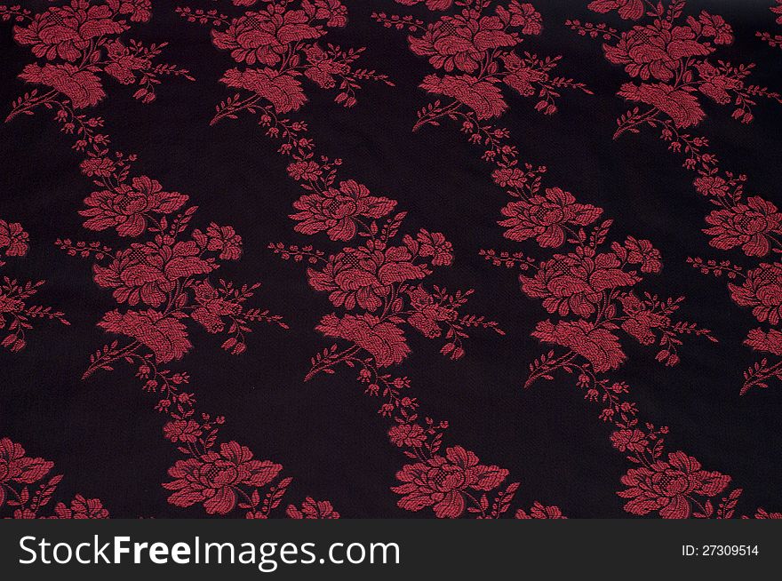 Black chinese  silk with floral pattern. Black chinese  silk with floral pattern