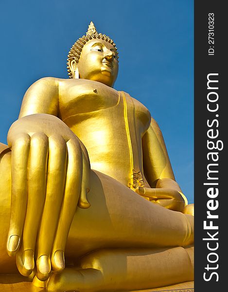 Image of color gold Buddha and the sky