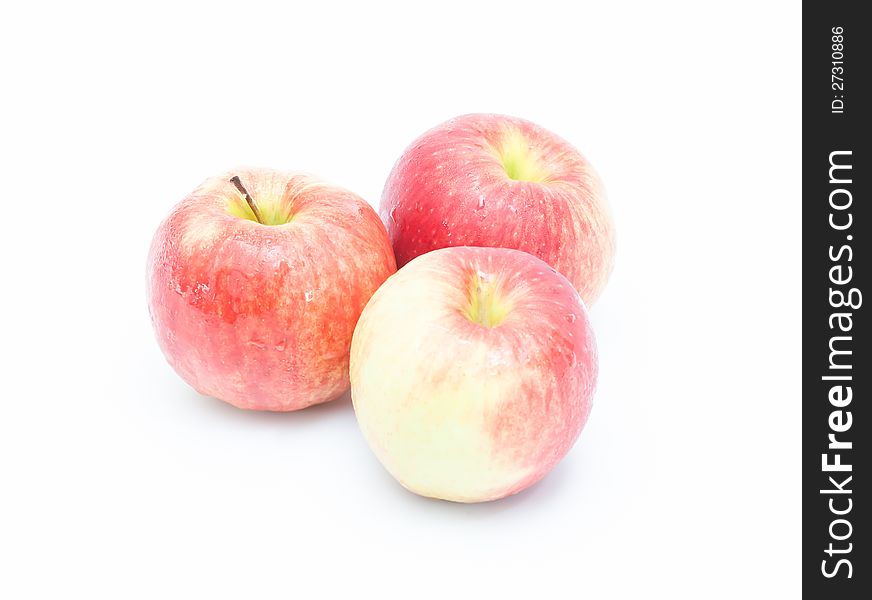 Three ripe juicy red apples. on white background