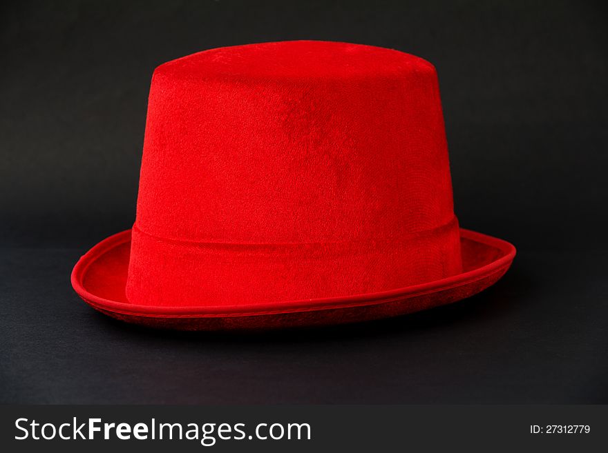 Red hat on black background