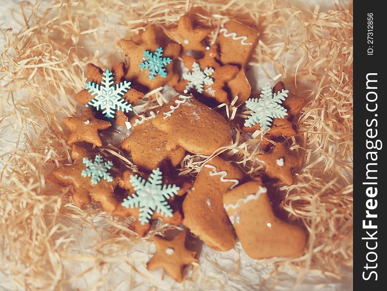 Christmas cookies in the form of stars and boots with snowflakes. Christmas cookies in the form of stars and boots with snowflakes