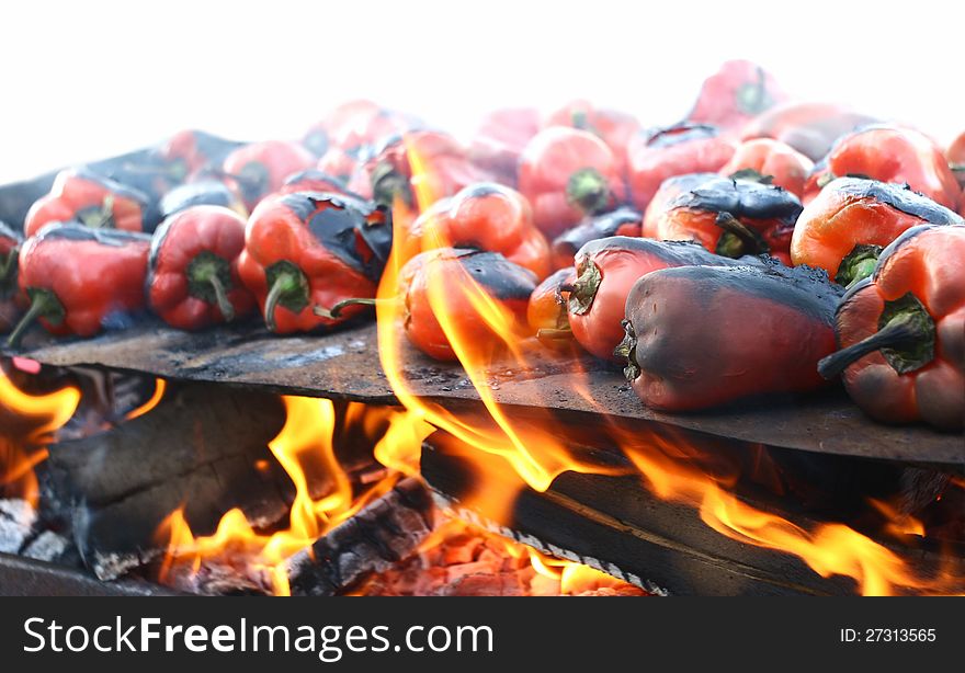 Some red peppers on fire preparing for canned. Some red peppers on fire preparing for canned