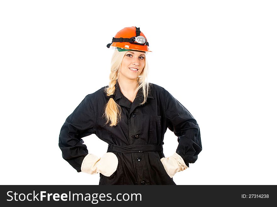 Happy girl in a construction helmet. Happy girl in a construction helmet