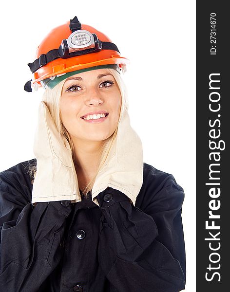 Happy girl in a construction helmet isolated on white background