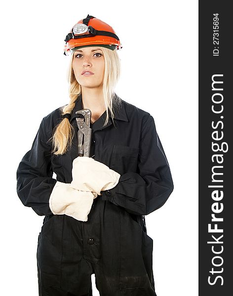 Builder girl in a helmet with a key
