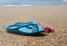 Flip-flops And Pink Starfish On The Beach Stock Photo Flip-flops And Pink Starfish On The Beach Stock Photo