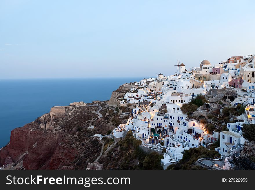 Sunrise on the island of Santorini, Greece, city oia