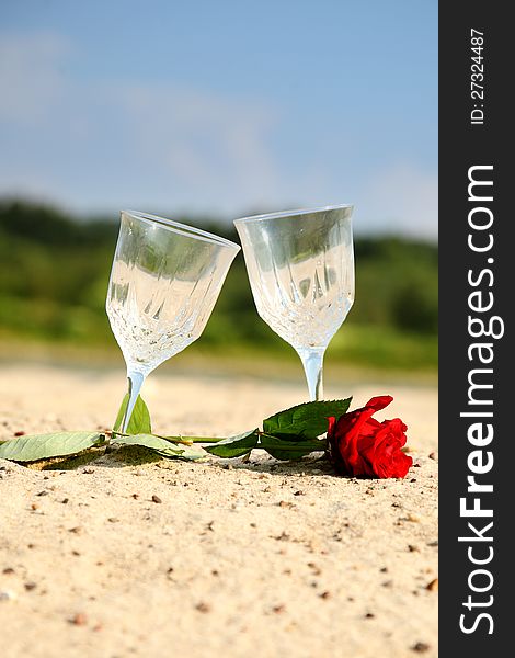 Empty Pair Glass On Sand Beach