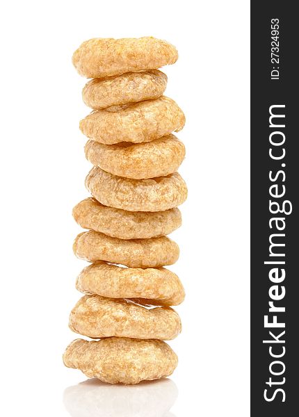 Tower of cereal rings on white background. Tower of cereal rings on white background