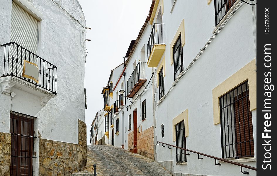 Steep narrow street in the ancient Ronda