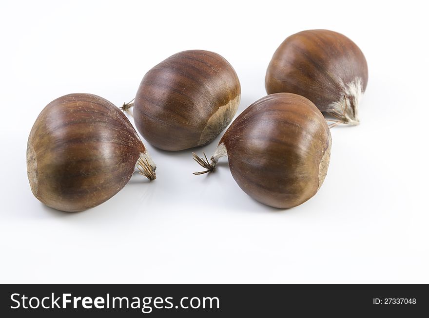 Nice shot of some chestnuts isolated on white background