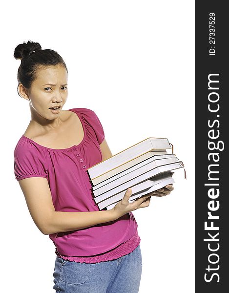 Asian college student carrying stack of books isolated over white background