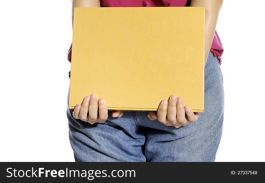 Woman bring book with her hand isolated over white background. Woman bring book with her hand isolated over white background