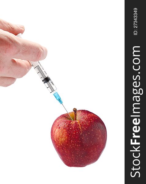 Red apple with a syringe on a white