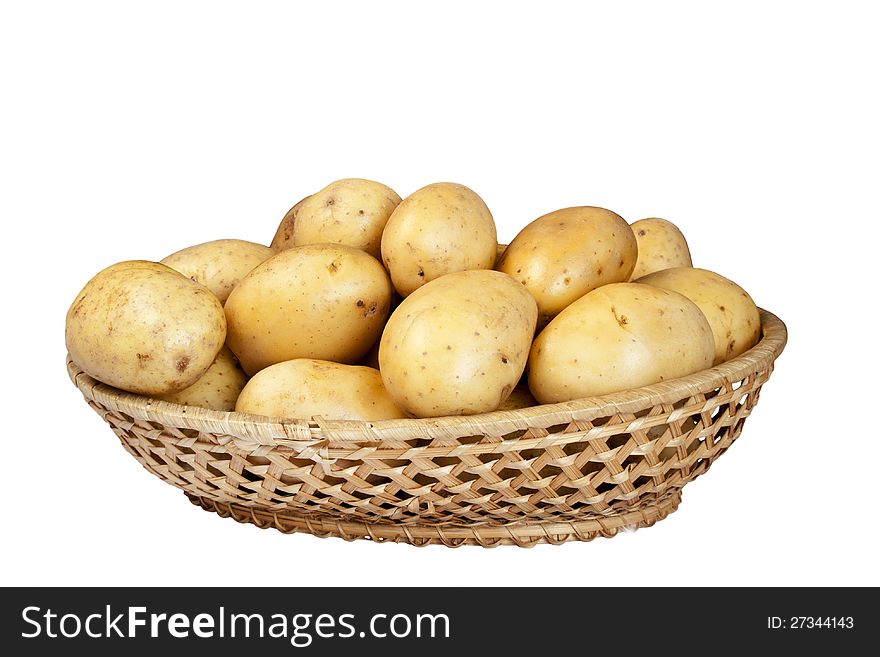 Potatoes in wicker basket isolated on white background. Potatoes in wicker basket isolated on white background